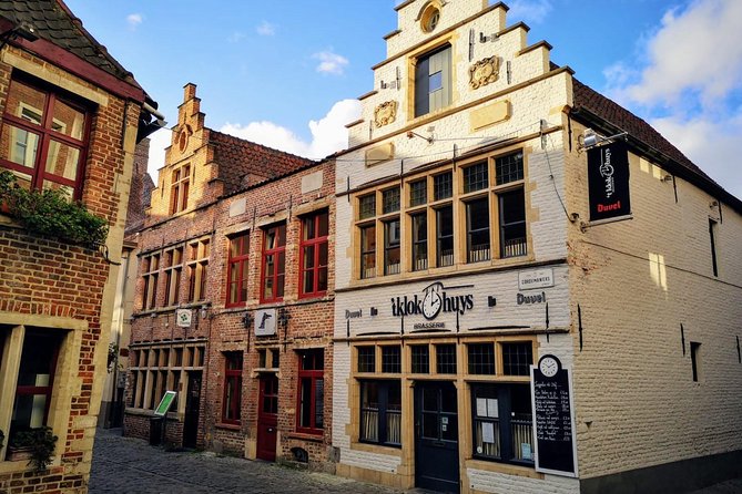Antwerp and Ghent Day Trip from Brussels With Atomium Photo Stop - Antwerp Walking Tour: Steen Castle, Grote Markt, and Rubens Stops
