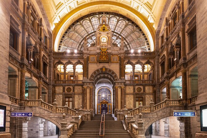 Antwerp: City Walk with Audio Guide in 7 Languages on your Phone - Brabo Fountain, the oldest exchange building, and chocolate-linked medicine