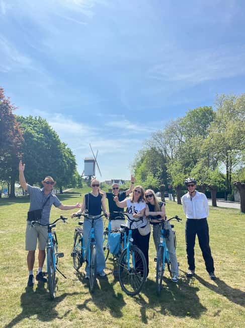Bruges: City Highlights Bike Tour - Burg and Market Square: the city core, explained fast
