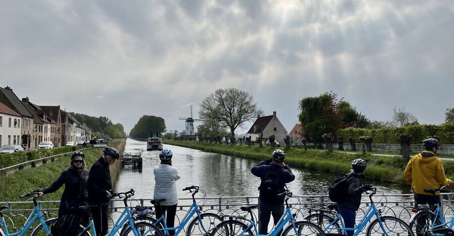 Bruges: Flatlands Guided Bike Tour - Your guide and the story stops that make it more than scenery