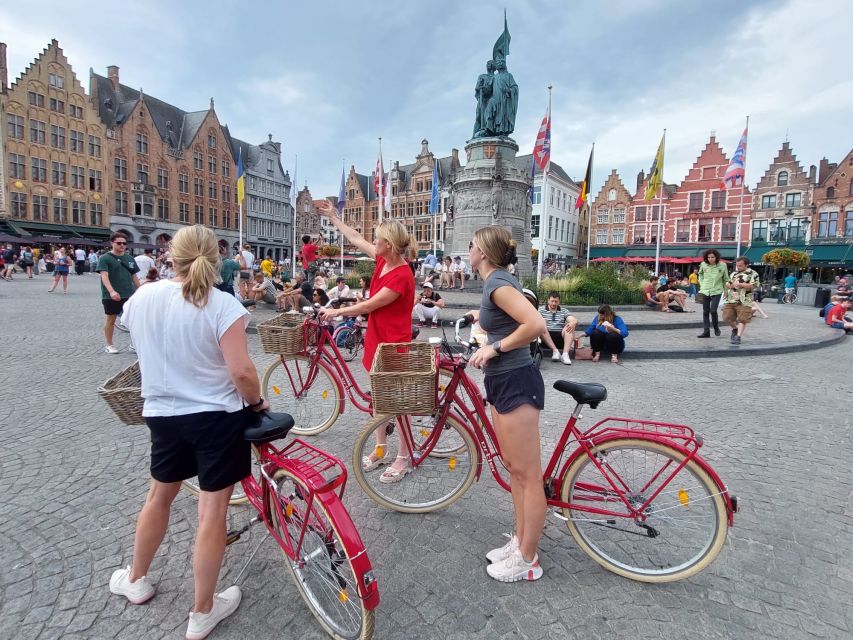 Bruges: Guided Retro Bike Tour of Highlights and Hidden Gems - Dukes Palace, city hall, and the power behind the beauty
