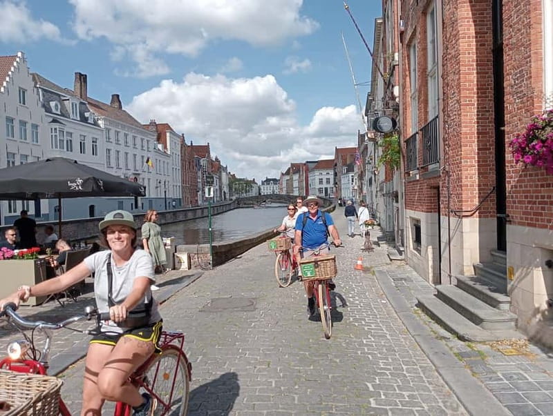 Bruges: Guided Retro Bike Tour of Highlights and Hidden Gems - Holy Blood Basilica and Church of Our Lady: quick photo stops with context