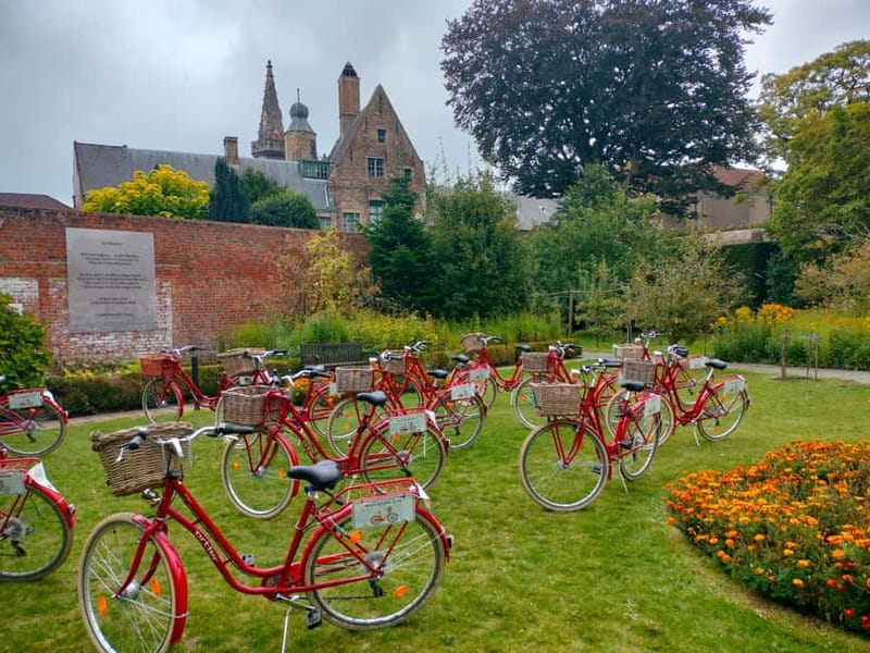 Bruges: Guided Retro Bike Tour of Highlights and Hidden Gems - Windmills and Lake of Love (Minnewater): the calmer side of town