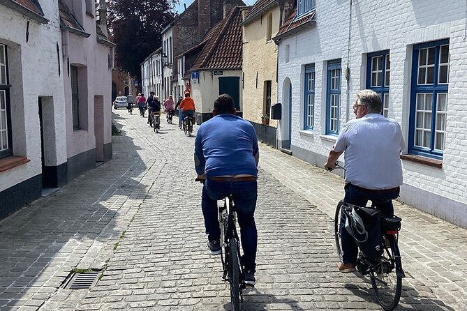 Bruges, Guided Retro Biketour: Highlights and Hidden Gems - Ten Wijngaarde beguinage and Jan Van Eyckplein: a softer side of the city