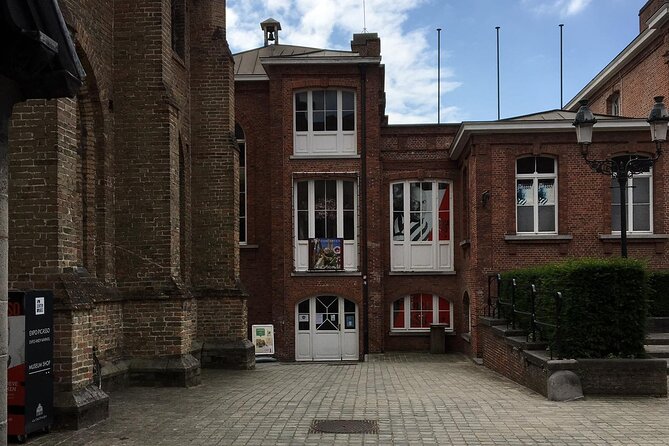 Bruges’ Legends and Hidden Treasures: A Self-Guided Audio Tour - Old Saint John’s Hospital and the butcher symbol connection