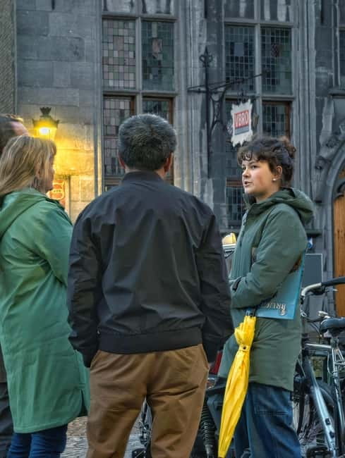 Bruges: Nightly Tales and Untold History Walking Tour - A Final Stop With a Local Flavor: Cafe Vlissinghe and Jan Van Eyck Square