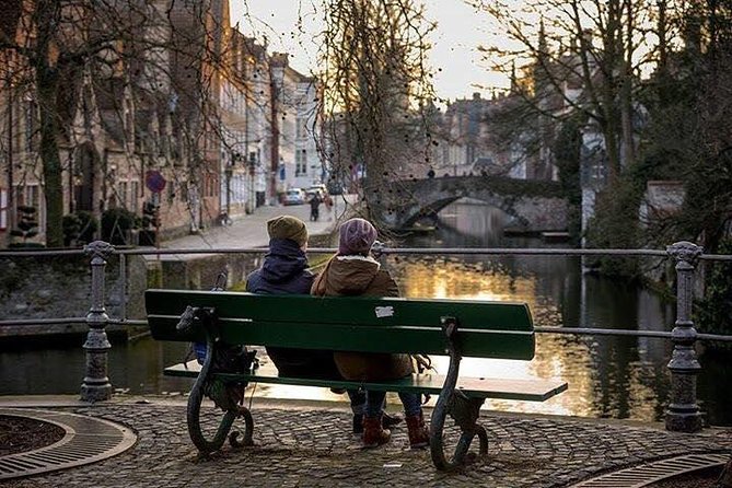 Bruges Uncovered: Historic Walking Tour & Canal Boat Experience - Meeting at Station Brugge, then stepping into the medieval core