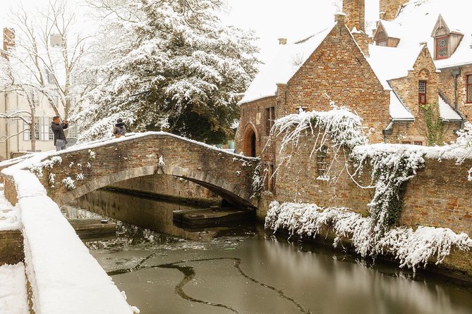 Bruges Uncovered: Historic Walking Tour & Canal Boat Experience - Museums and canal-photo stops that keep the walk moving
