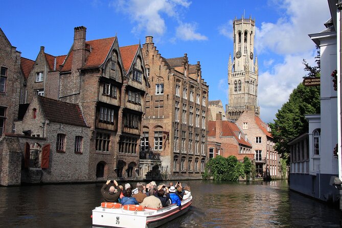 BRYGGJA ROMANTICA - 3 Hour Romantic Tour in Bruges - Burg Square and Poorters Loge, the city office story most people skip