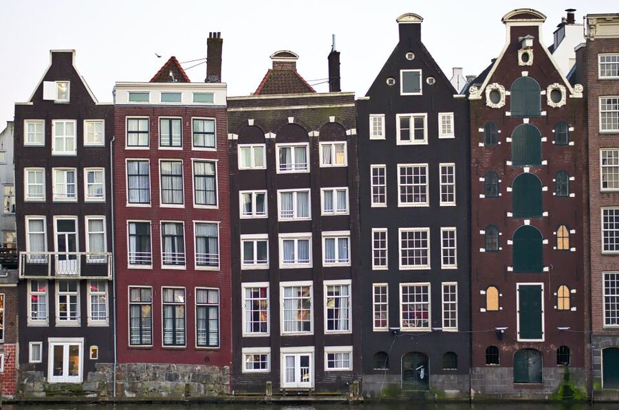 From Brussels: Cheese, Clogs & Windmills Amsterdam Day Trip - Amsterdam orientation by bus, then your own city time