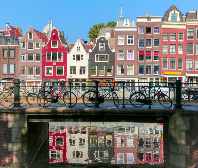 From Brussels: Cheese, Clogs & Windmills Amsterdam Day Trip - The canal cruise window: worth it, plan for add-ons