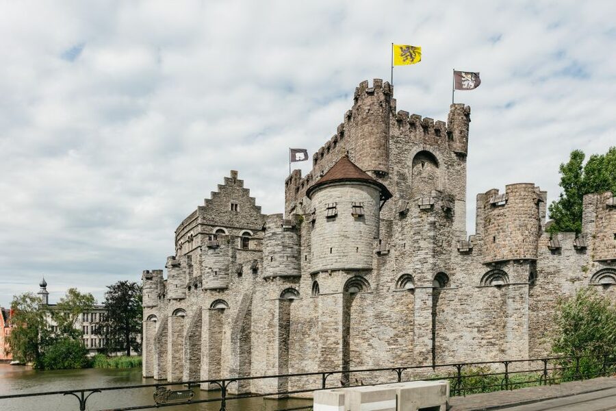 From Brussels: Guided Day Trip to Bruges and Ghent - Walplein Square, Stoofstraat, and the Medieval Layers You Can Feel