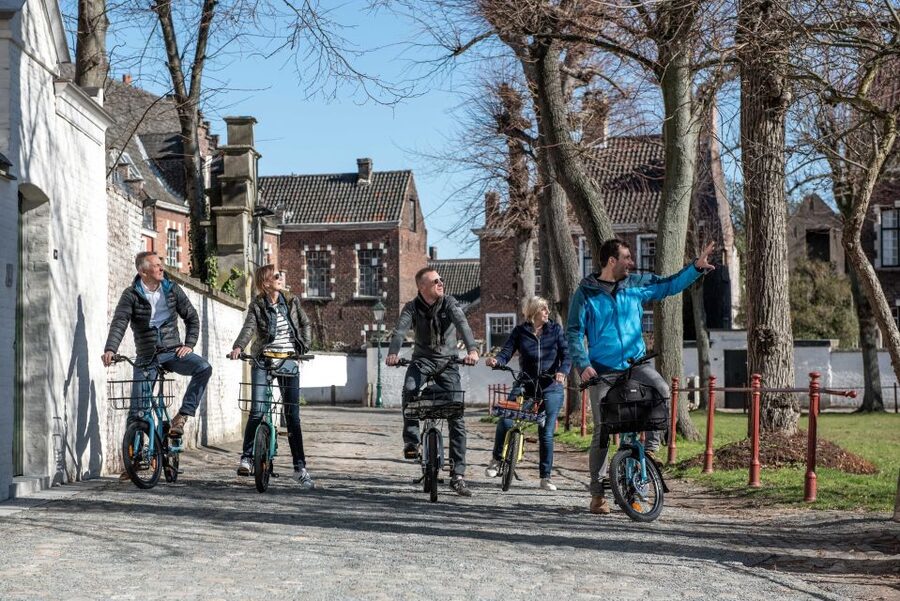 Ghent: City Highlights and Hidden Gems Guided Bike Tour - Meeting Your Guide at the Gate