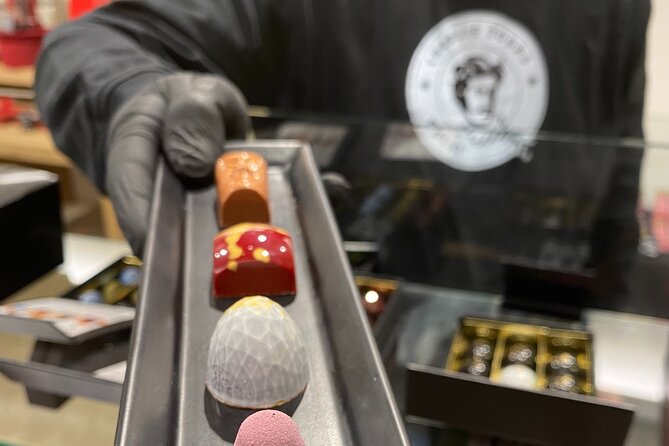 Ghent: Famous Belgian Chocolate Walking Tour with Tastings - Stop 5: Chocolaterie Van Hoorebeke and the Passion Fruit Surprise