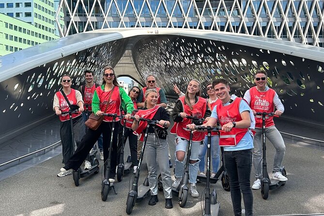 Guided E-kickscooter tour: The big five of Antwerp - Scheldt Docks South: Quayside Views and an Included Ticket