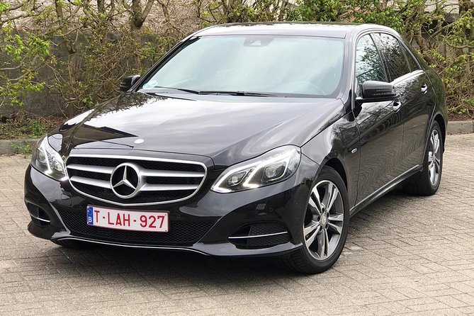 Luxury vehicle from Brussels airport to the city of Brussels - Luxury Ride, Executive Sedan Feel, and Professional Driving