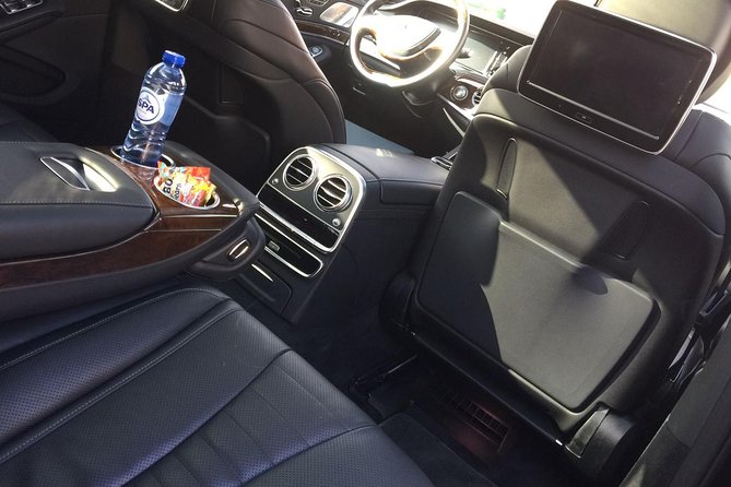 Private Arrival Transfer from Brussels Airport to Bruges with Business car - Business Car Comfort: Water and Wi-Fi for the Ride