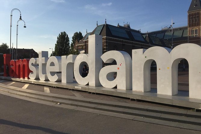 Private taxi Transfer from Bruges to Amsterdam - What the English-speaking, suit-and-tie driver changes