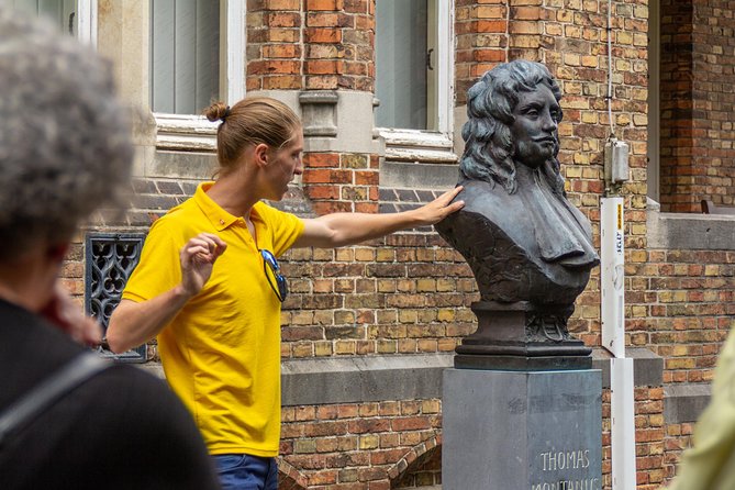 THE Storytelling Tour of Bruges | First Day Must | History & Tips - Huidenvettersplein and the pralines stop you’ll remember